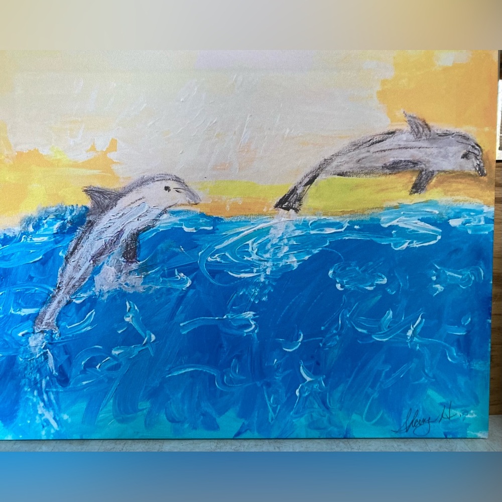 Vibrant Ocean Dolphins Canvas Art Print.  Maybe a fun pic for a kid’s room